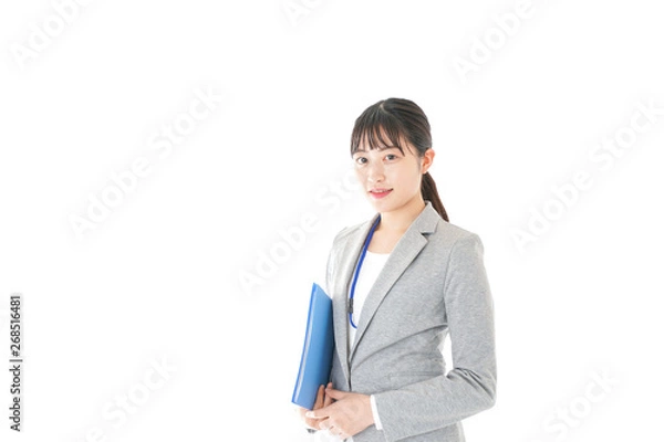 Fototapeta 書類を持つビジネスウーマン