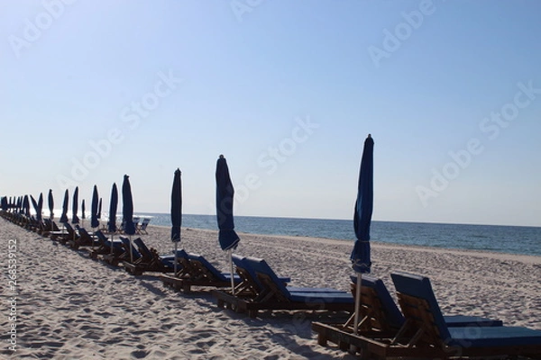 Fototapeta chairs on beach