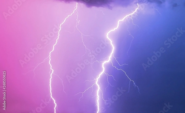 Fototapeta Lightning strikes the sky.