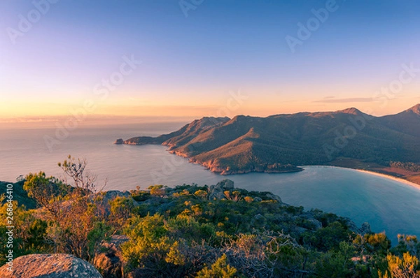 Obraz Sunrise landscape of ocean coastline with mountains and beach