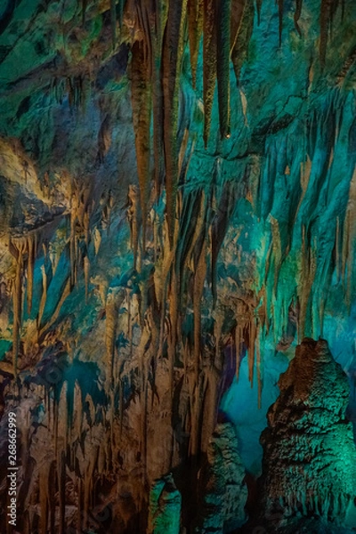 Obraz illuminated stalagtites in Prometheus Cave