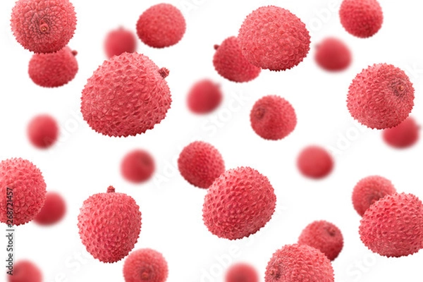 Fototapeta Falling lychee, isolated on white background, selective focus