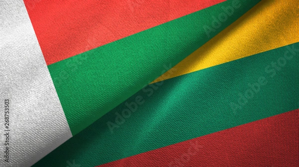 Fototapeta Madagascar and Lithuania two flags textile cloth, fabric texture
