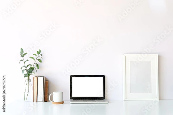 Fototapeta Workspace desk and laptop. copy space and blank screen. Business image, Blank screen laptop and supplies.