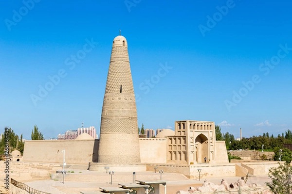 Fototapeta Emin minaret, or Sugong tower, in Turpan, is the largest ancient Islamic tower in Xinjiang, China. Built in 1777, its grey bricks form 15 different patterns such as waves, flowers or rhombuses