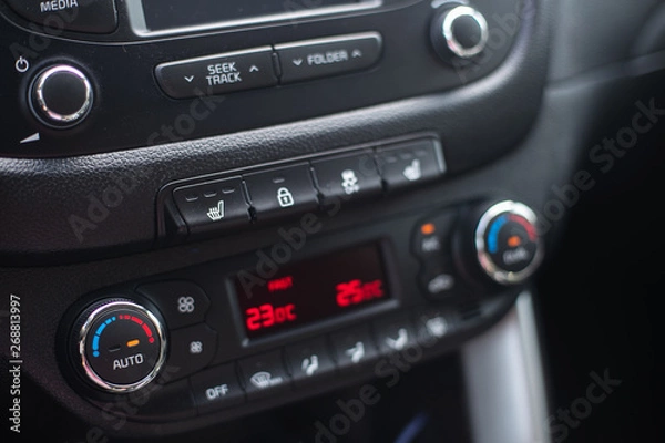 Fototapeta Modern car dashboard. Screen multimedia system. Climate control.