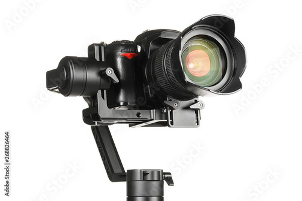 Obraz Gimbal three-axis motorized stabilizer with mounted DSLR camera isolated on white background