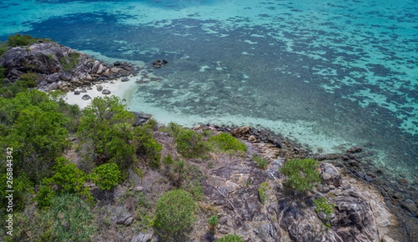 Fototapeta Aerial drone view part of rocky paradise Koh Kra island with lagoon sea in background, Thailand