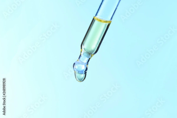 Fototapeta oil drop on the pipette