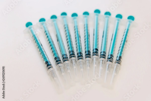 Fototapeta Treatment against addiction. Vaccination of people. Insulin injection