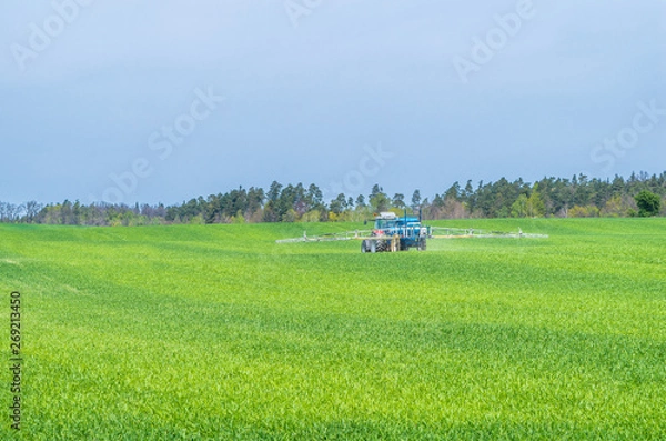 Obraz Traktor pracujący na polu