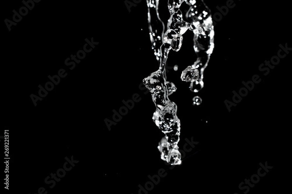 Obraz Water splash isolated on black background