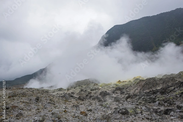 Fototapeta view of crater on active mountain with sulfur gas come out from stone. Beautiful landscape of mount Papandayan. Papandayan Mountain is one of the favorite place to hike on Garut.