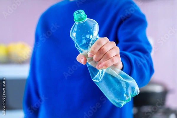 Fototapeta Rejection of plastic bottles and plastic free. Stop plastic. Environmental protection and ecology care