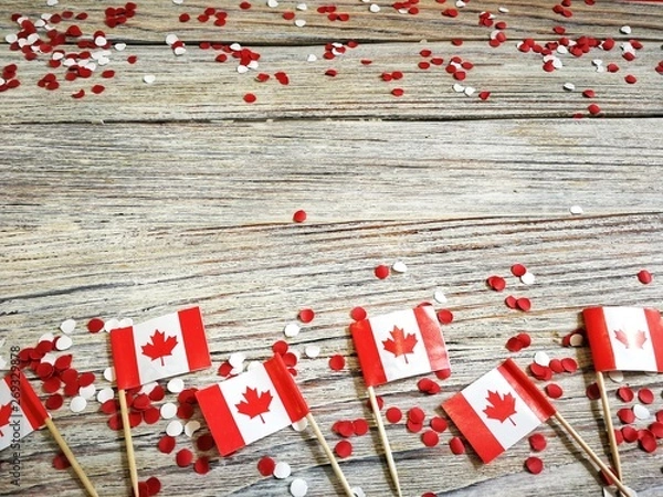 Fototapeta The national holiday of July 1- happy Canada day , Dominion day, the concept of patriotism, independence and memory, a place for text . horizontal