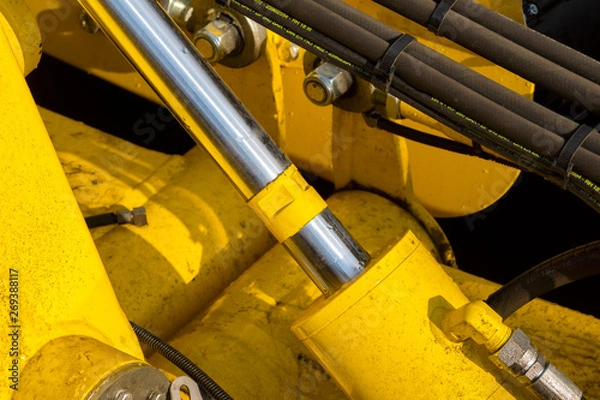 Fototapeta Close up of pipe system of hydraulic valves in agricultural machinery