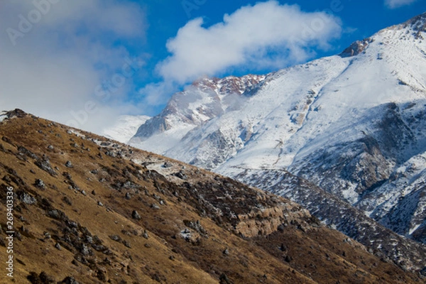 Fototapeta snow on the mountain and clouds 