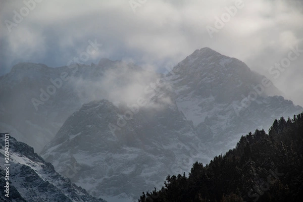 Fototapeta snow on the mountain and clouds 