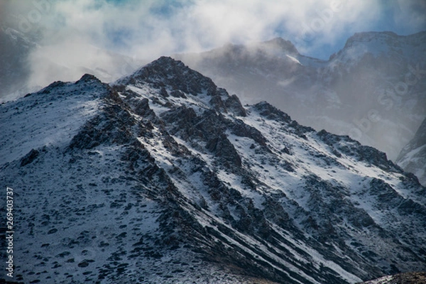 Fototapeta snow on the mountain and clouds 