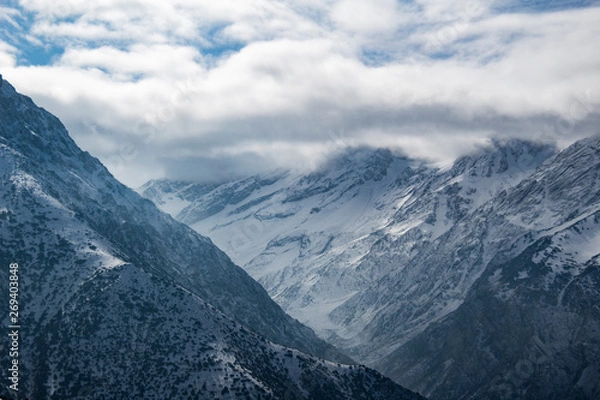 Fototapeta snow on the mountain and clouds 