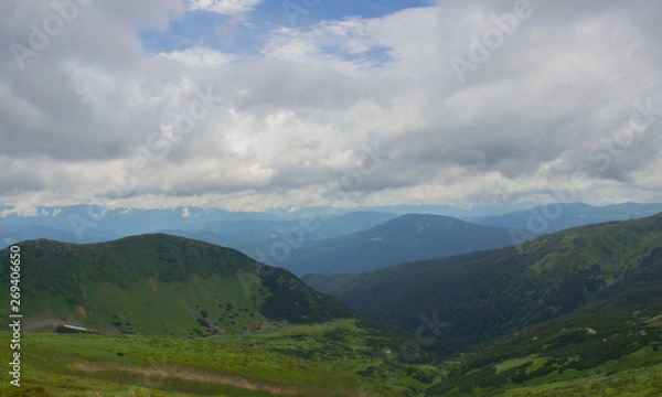 Fototapeta Hiking with a tent through Petros to Hoverla, Lake Nesamovite, Mount Pop Ivan Observatory.