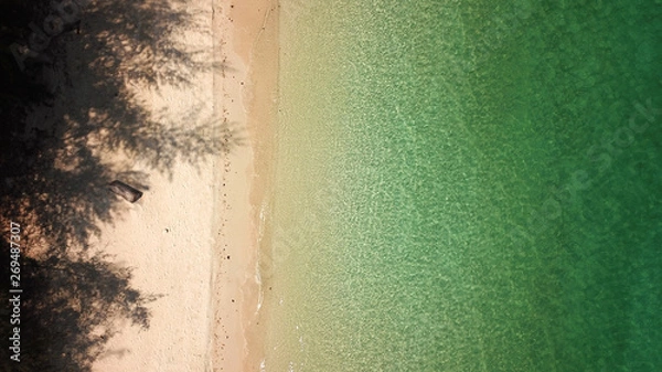 Obraz Drone view of beautiful beach. Aerial drone shot of turquoise sea water at the beach