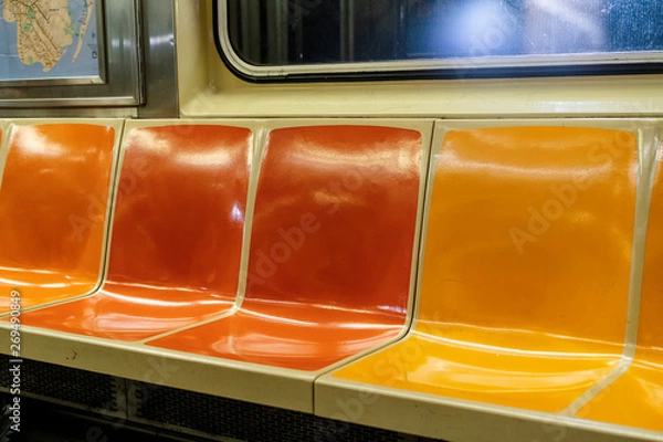 Fototapeta Colorful seats in a New York City subway car