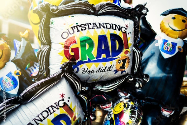 Fototapeta Colorful Hellium Graduation balloons