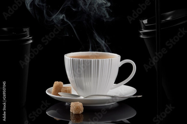 Obraz White cup of coffee and black paper cup for hot drinks on a black background.