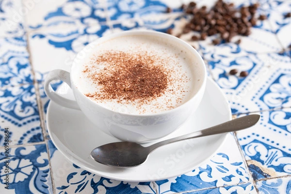 Obraz cappuccino on rustic blue tile