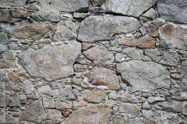 Fototapeta medieval texture of field stones of a fortress wall