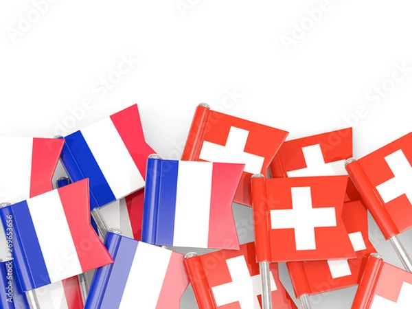 Fototapeta Pins with flags of France and switzerland isolated on white.