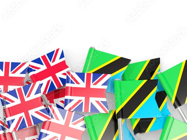 Fototapeta Pins with flags of UK and tanzania isolated on white.