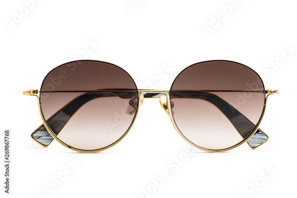 Fototapeta Luxury sunglasses isolated on white background. With clipping path for artwork or design. Light brown.