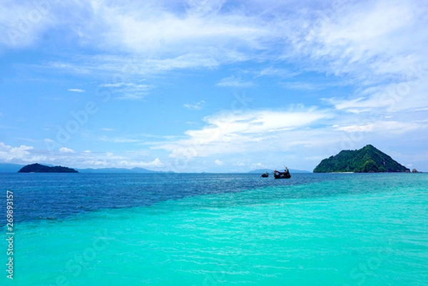 Obraz Beautiful blue and turquoise seascape with islands and clear blue sky. Nyaung Oo Phee island in myanmar