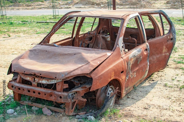 Obraz Burned car with burnt conditon in isolation