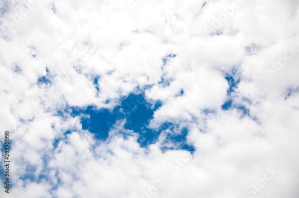 Obraz blue sky in the clouds. On a summer day