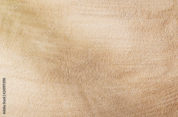 Obraz Sandy beach background top view with visible sand texture. Backdrop for mockups and advertising.