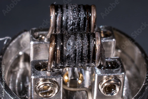 Fototapeta Deteriorated vaping coils. RDA. Vape mod