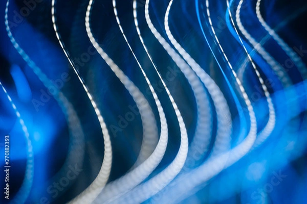 Obraz Colorful pattern of blue dynamic neon lines. Modern background. Art concept of lighting effects.