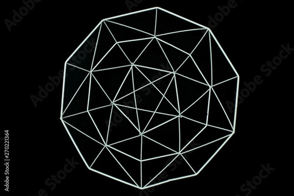 Fototapeta Metal wire decorative elements, basket, vase on a black background. MInimal concept. Beautiful abstract pattern of metal wire.