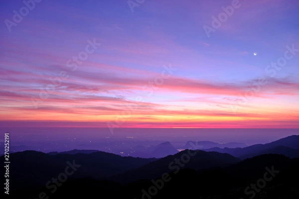 Fototapeta Twilight light pink and purple colors beautifully. reflect the views Mountains and fog in the morning. Khao Jed Yod, Trang in Thailand.