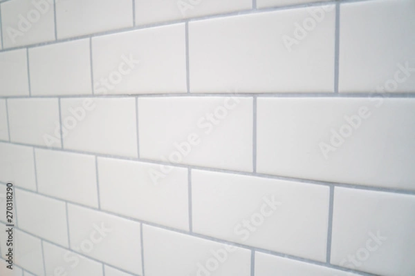 Fototapeta White subway tile with gray grout .