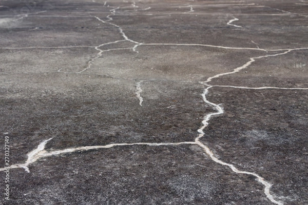 Fototapeta Asphalt crack on the roof surface