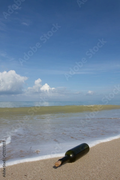 Obraz A bottle on  beach