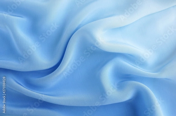 Fototapeta silk fabric texture, background  pastel blue color . copy space