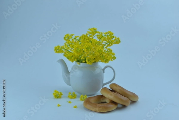 Obraz tea kettle with yellow flowers