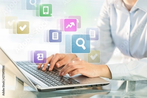 Fototapeta Woman Working with Laptop on blurred background, close-up