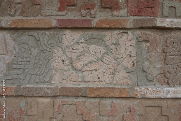 Fototapeta Ancient Mayan stone carvings on the pyramids at The Ancient City of Tula, Mexico