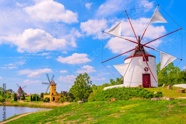 Obraz Colorful windmill in Gifhorn of the lake in summer